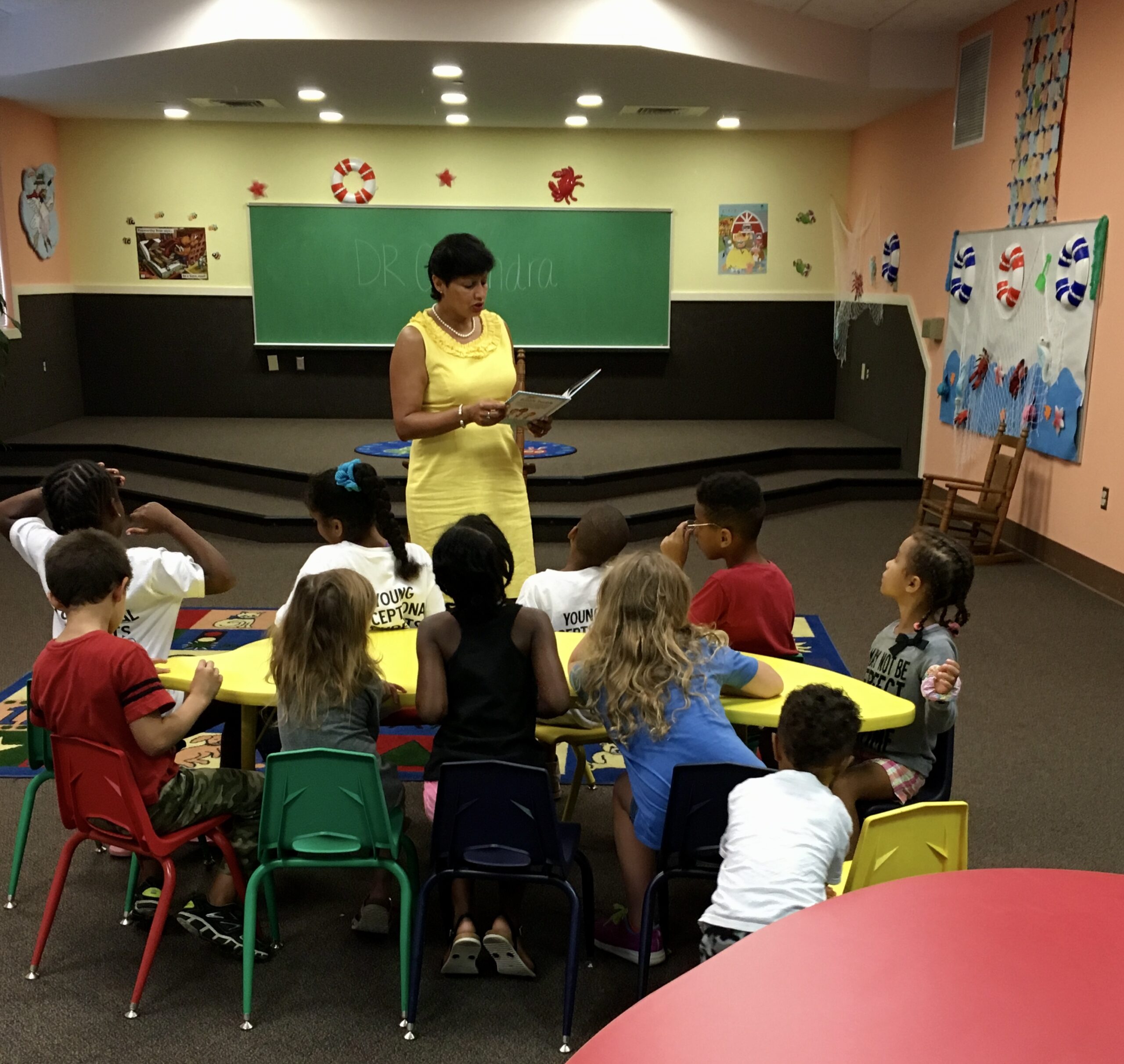 Dr. Chandra reads to children