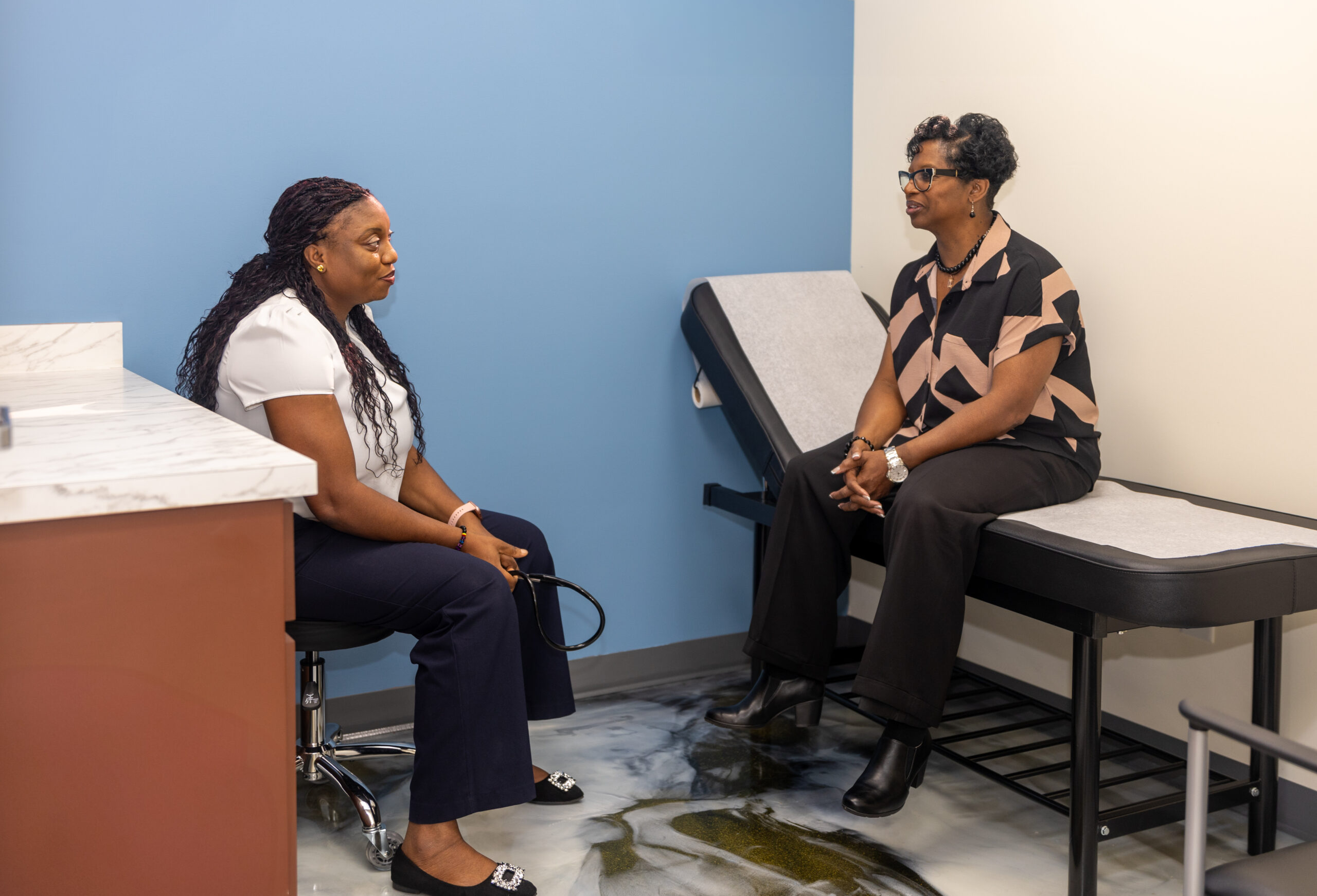 Dr. Obiaigwe with adult patient